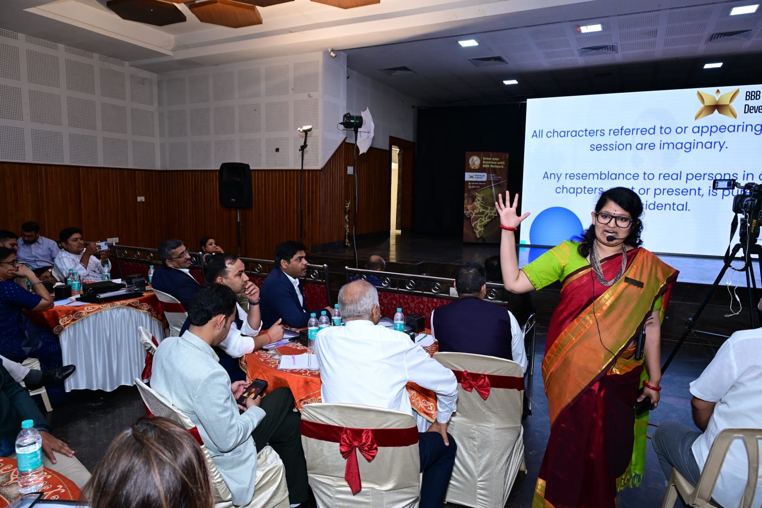 Janani Ramakrishnan leading an interactive exercise with a professional audience