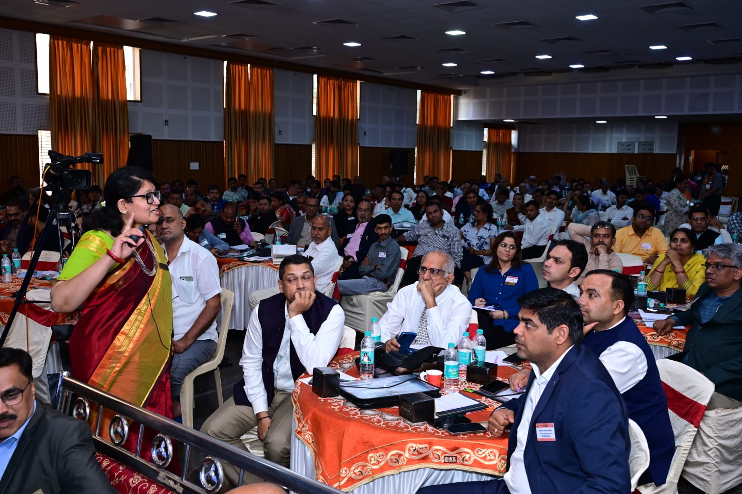 Janani Ramakrishnan in conversation with professionals at a leadership event