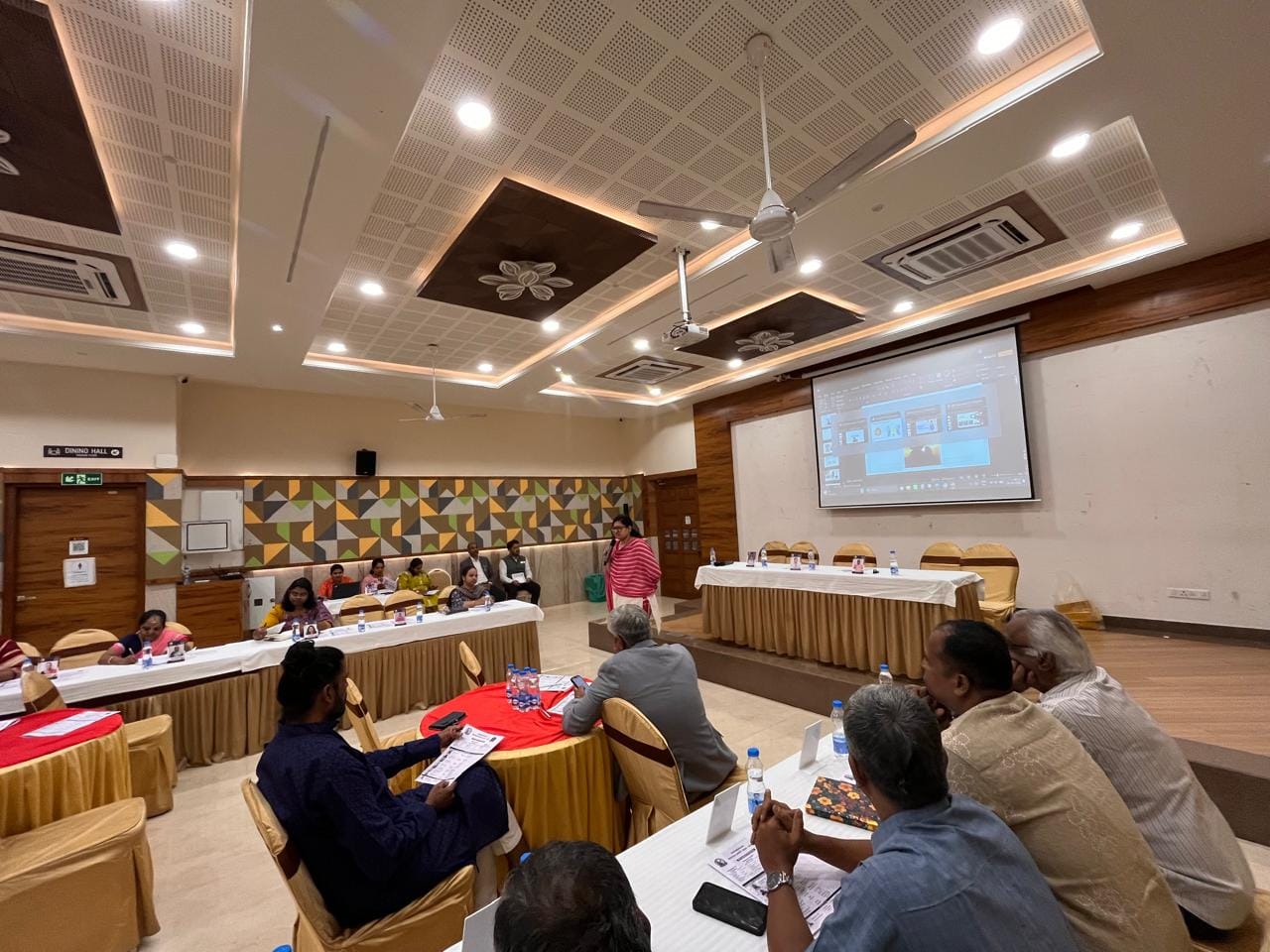 Janani Ramakrishnan facilitating a workshop in a conference room