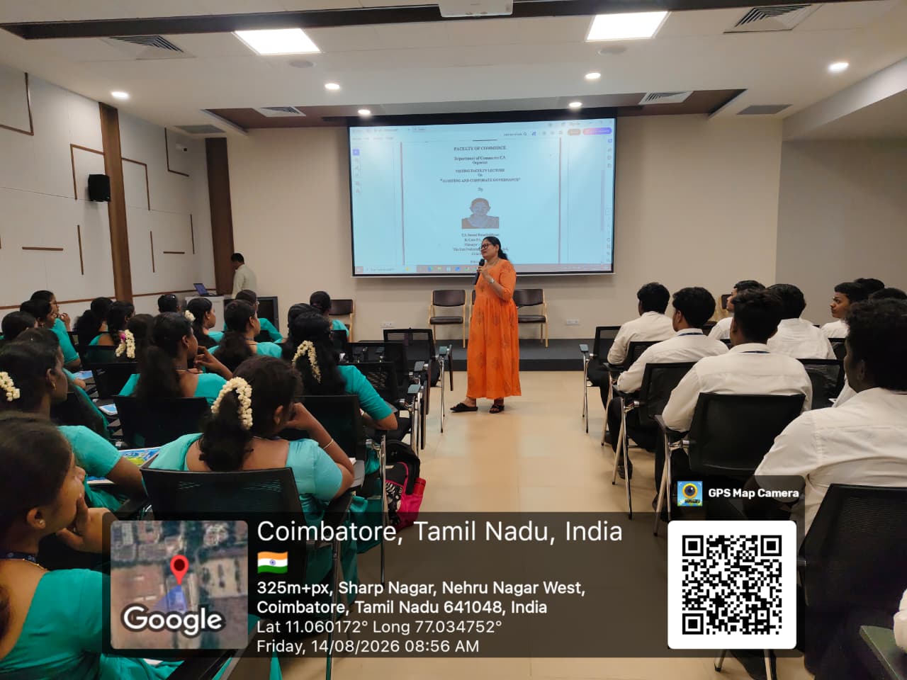 Janani Ramakrishnan delivering a guest lecture in front of a projection screen